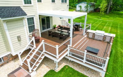 Custom new deck with contrasting white aluminum railings, custom seating and inviting louvered roof in Mill Creek, WA