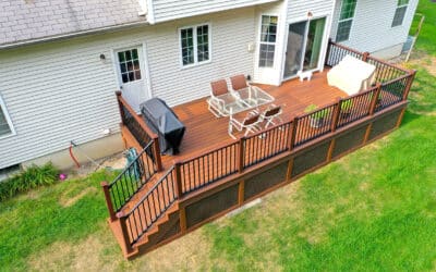Composite deck resurfacing project with dark aluminum rails and attractive lattice skirting in the same color as the deck in Snohomish, WA