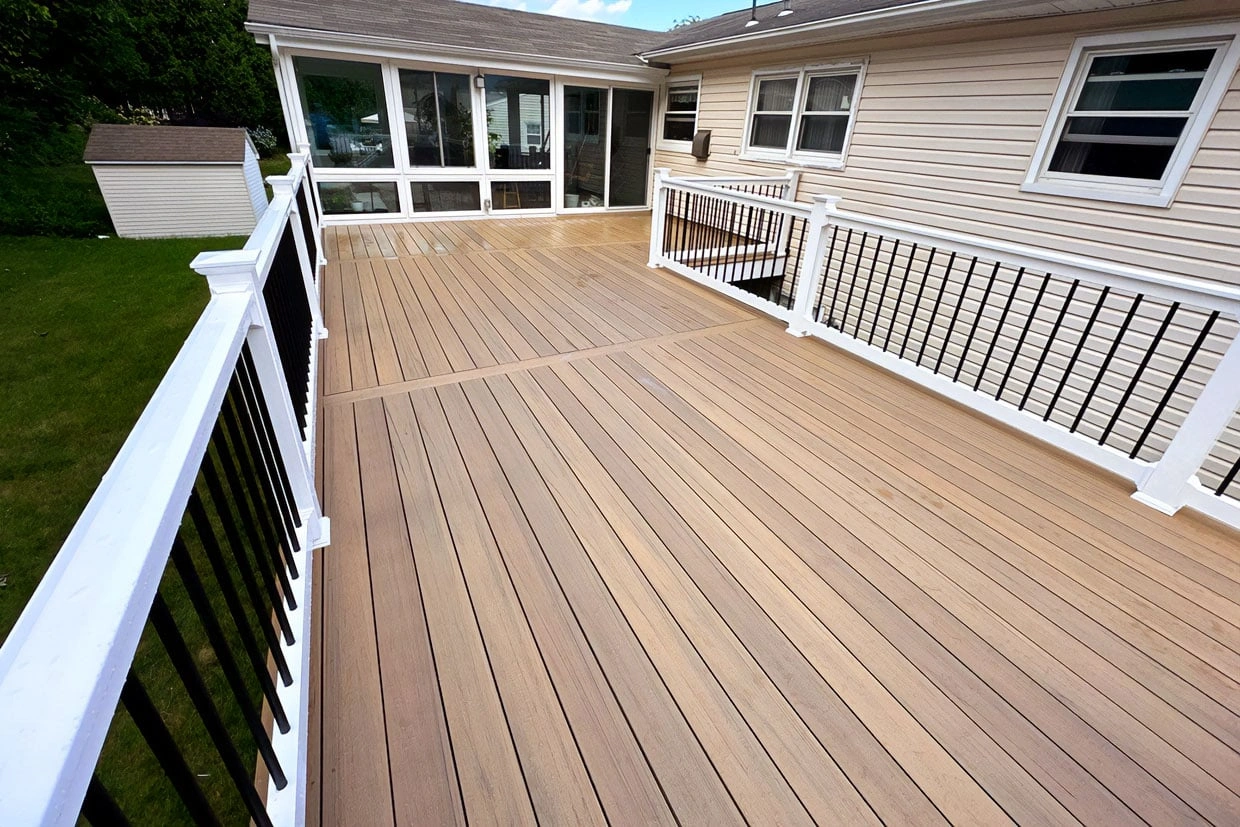 A stunning outdoor deck with sleek, modern railings, showcasing the quality craftsmanship of Best Deck Builders Near You.