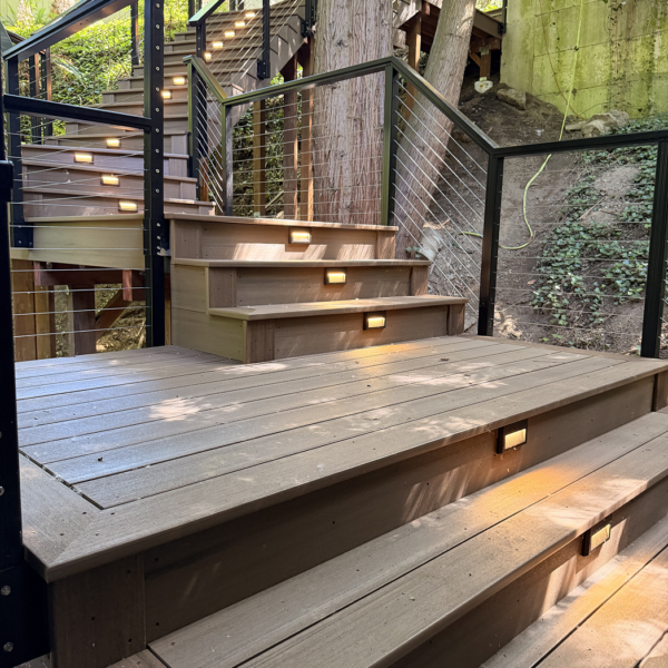 Close-Up Of Lower Composite Deck Landing And Steps With Glowing Led Riser Lights.