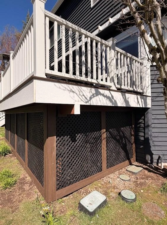 Olympic Decks Elevated structure featuring dark lattice skirting built during a Trex Transcend deck replacement.