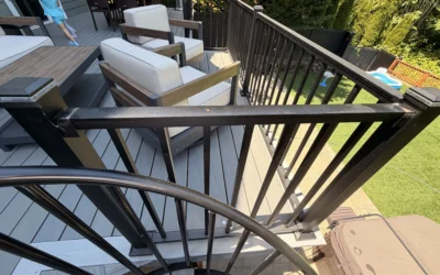 Trex Transcend deck replacement Curved Black Metal Handrails And Gray Composite Boards Featured On A Trex Deck Replacement In Issaquah.