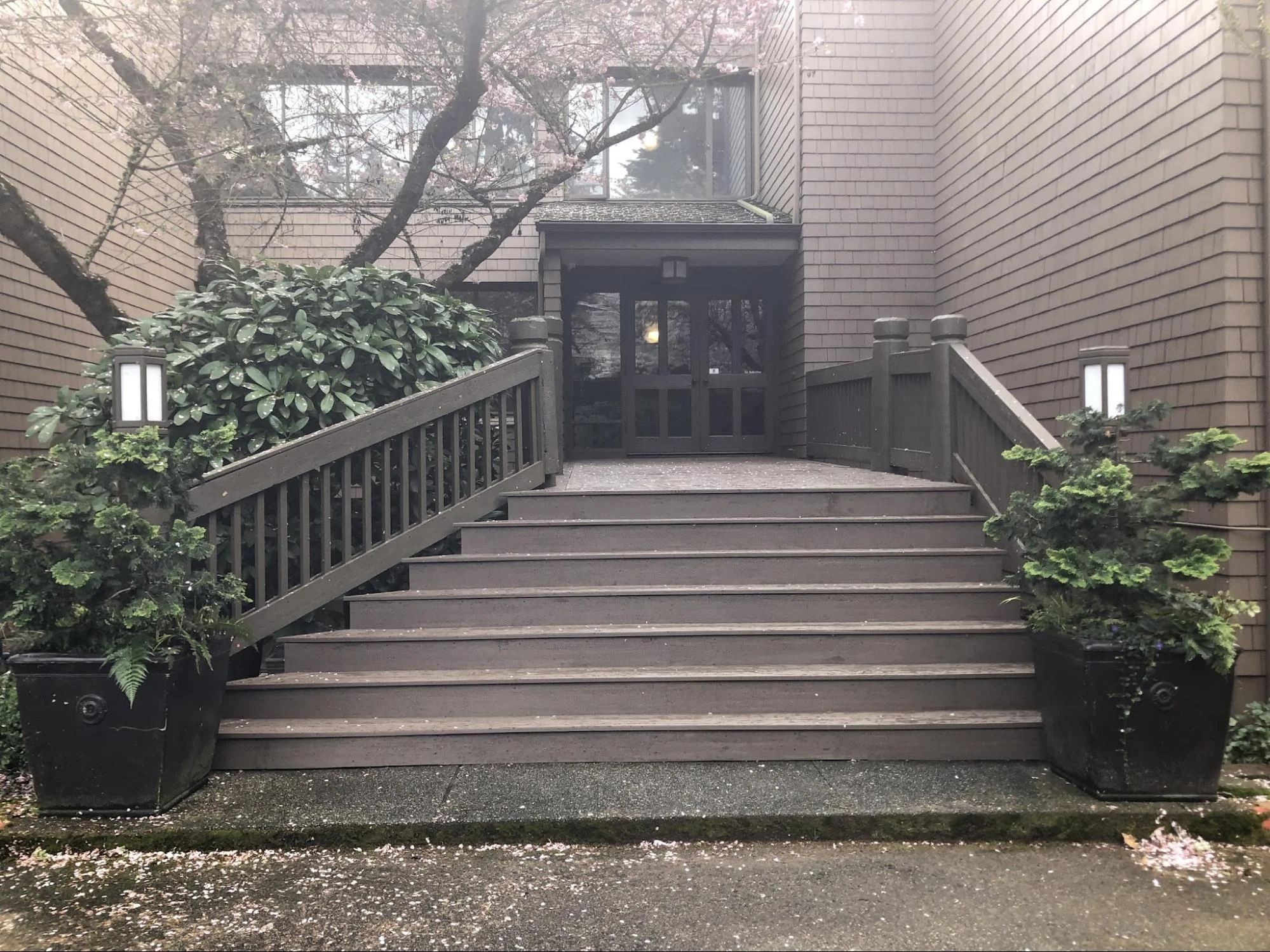 Existing Front-Entry Deck With Wide Wooden Stairs Before Replacement In Seattle, Wa